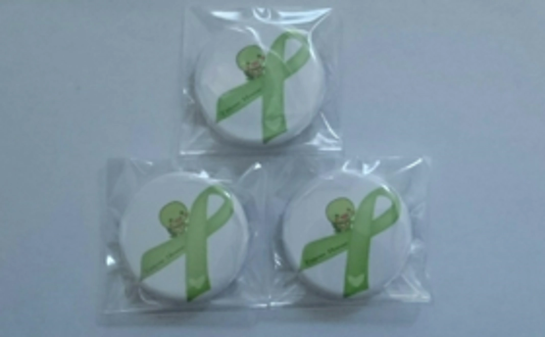 NPO法人心を結ぶタイヨウハウスロゴバッチをプレゼント！