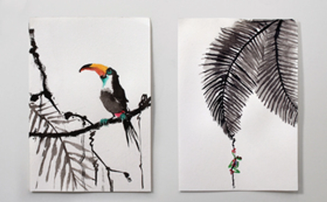 絵本1冊と、作家直筆の熱帯雨林の動物を描いた花鳥風月水墨画1枚