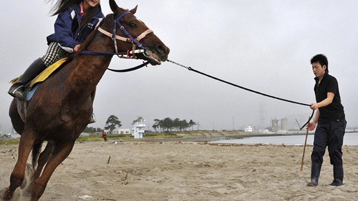 復興応援写真展「祭復活を願って 走れ！騎馬武者～相馬野馬追～」