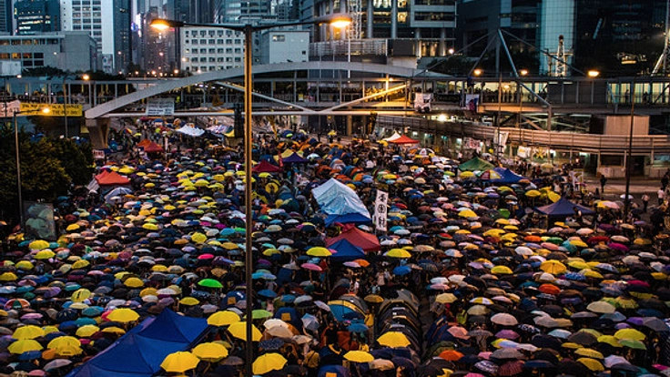 普通選挙権を求めて起こった”香港雨傘運動”に触れる写真展開催