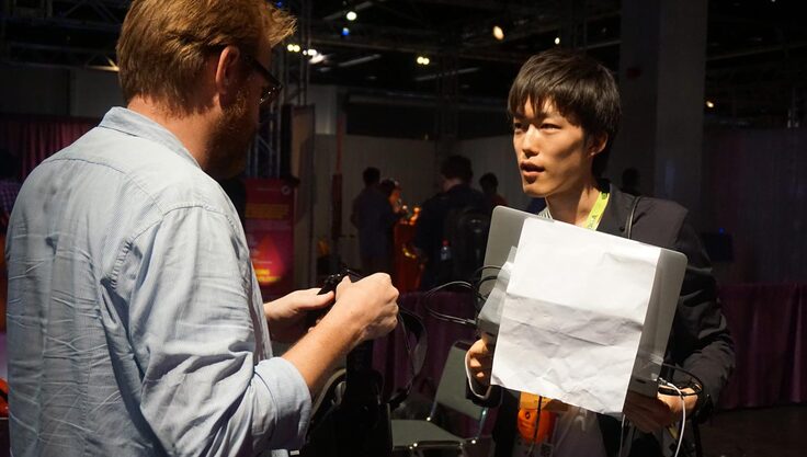 学会発表をする執筆者