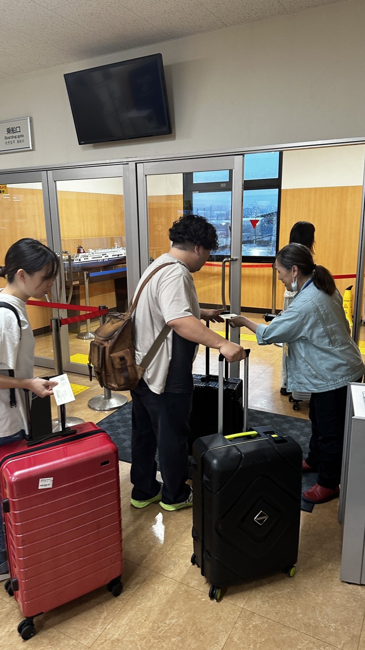 新門司港を出発する教員